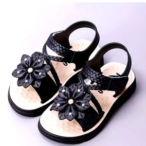 Nwt.Kids Black and Cream Sandals with embelished Flower